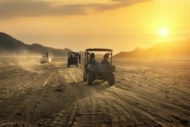 Buggy riding in desert